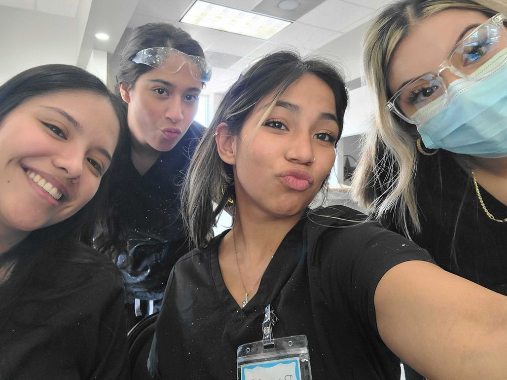 Dental assistant students in hands-on training