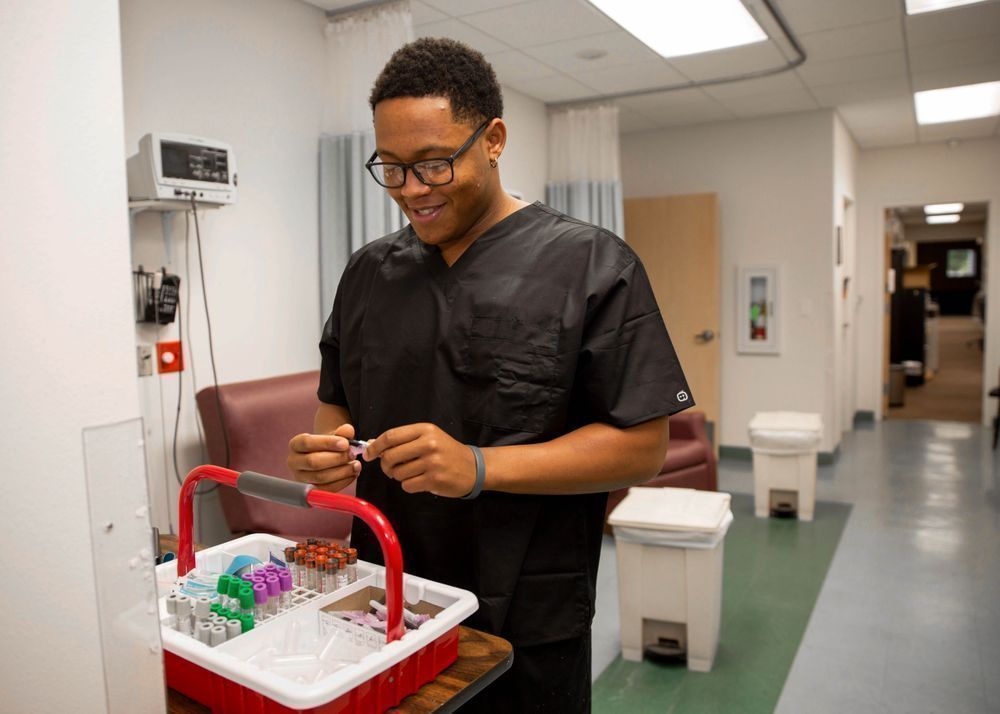 Medical assistant working in a hospital clinical setting